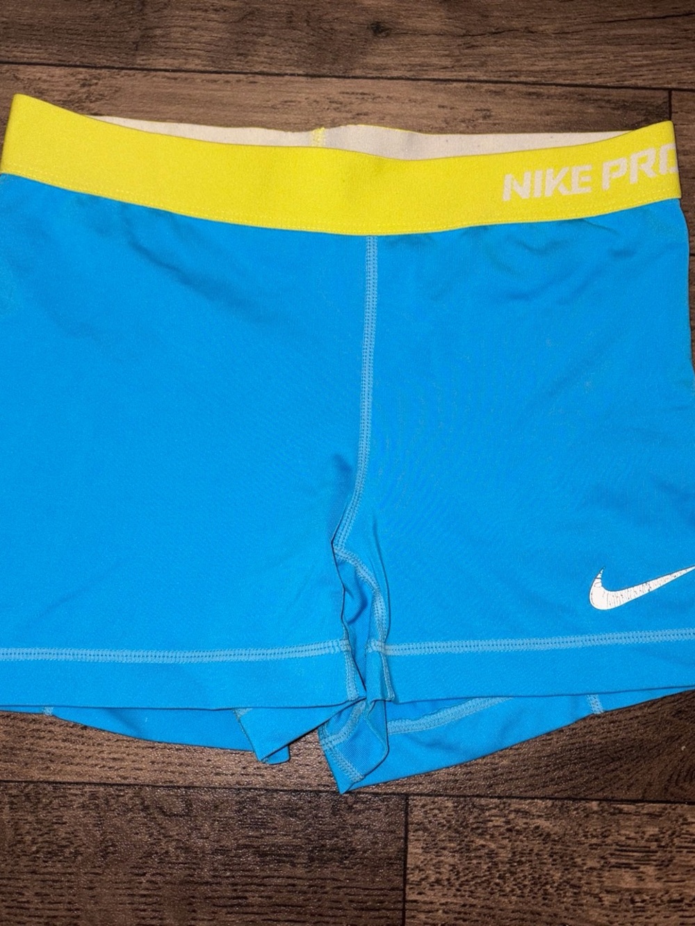 Nike Blue Pro Compression Spandex Athletic Shorts with Yellow Stitching